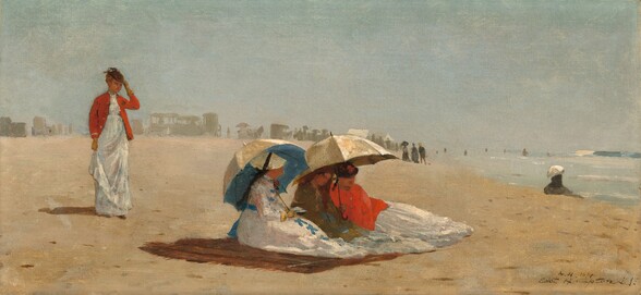 Four women with pale, peach skin, wearing long white dresses, stand or sit on a sunny beach in this wide, horizontal painting. People and carriages are painted as hazy gray silhouettes spread along the beach in the distance. The silhouettes span the left half of the horizon, which comes halfway up the painting. To our right, the water is a pale blue with loose strokes of white, light gray, and ice blue to suggest waves and surf. On the pale sand, three of the women sit close to us, huddled under two broad parasols on a brown blanket. Their bodies face the water, and their features and clothing are loosely painted. The woman closest to us has a white dress with lapis-blue bows down the front and a blue sash tied at her back. Her flat, round, straw-yellow hat is tied onto her head with a black bow. She wears a yellow glove on the hand we can see, and she props one parasol over her far shoulder. The inside of the parasol is bright blue, the outside cream white. The other two women sit together under the second parasol, also cream colored. In the center of the trio, the woman wears an olive-green shawl or wrap, and her reddish-brown hair might be loose over her shoulders. The third seated woman wears a bright red wrap and a dark hat. A bit behind these women, a fourth stands looking toward them or the water. She also wears a long white dress under a vivid red jacket and a small brown cap. She holds her skirt with one hand and touches her hat with another gloved hand. Another loosely painted form farther back along the beach appears to be a woman wearing black and holding a white parasol. The artist signed and dated the painting with the location in the bottom right corner: “W. H. 1874 East Hampton L. I.”