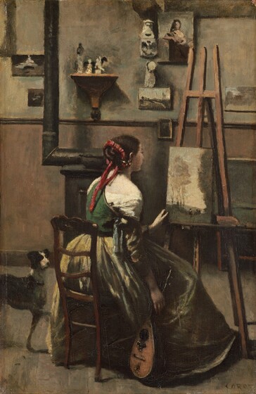 A young, pale-skinned woman sits with her back to us as she looks at a painting on an easel in a studio in this vertical painting. She sits in a ladder-back wood chair so her knees angle away from us, toward the back right corner of the studio. We look onto the side of her right cheek as she leans forward. Her brown hair is combed back and twisted into a bun wrapped with a raspberry-red ribbon that trails down her back. Touches of pearl white, pale pink, and silvery gray suggest flowers by the ear we can see. A cream-white chemise falls off the shoulder closer to us, under a grass-green bodice. She holds a mandolin down by her right side, which is closer to us, to nestle in the folds of her voluminous, olive-green skirt. She reaches forward with her other hand to touch the lower left corner of the painting resting on the easel. That vertically-oriented scene is loosely painted and shows a few people gathered in a landscape. A white and black dog stands with one front leg lifted to the left of the woman's chair, looking at her. The wall opposite us is parchment white over a strip of molding, like a high chair rail, and muted mauve pink below. An L-shaped pipe leads to an iron stove to our left of center. A narrow shelf tucked into the L of the pipe holds three hand-sized sculptures or casts. Small paintings and plaster casts hang around it on the wall above the molding. The artist signed the painting in the lower right: “COROT.”
