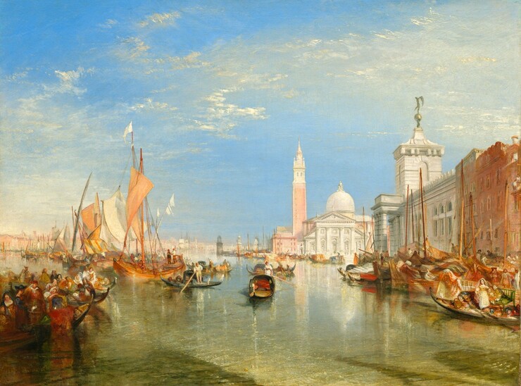 We look across a glittering waterway lined with long, low boats and sailboats at an ivory-white church in the distance to our right in this horizontal landscape painting. The horizon line comes about a third of the way up the composition, and wispy white clouds sweep across the brilliant azure-blue sky above. A row of buildings comes into view lining the canal to our right, with a terracotta-orange building followed by a cream-white building beyond, both angled toward the church. The church has a high dome rising over the temple-like front, which has columns supporting a triangular pediment. A tall bell tower rises to the left of the church. The low boats, gondolas, to our left are packed with people while a few gondolas floating in the center of the canal appear occupied only by their gondoliers who stand holding their poles. Painted in tones of ivory and peach, the sails of boats behind the gondolas to our left billow in the breeze while the sails of vessels docked to our right are furled. The structures, boats, and people cast shimmering reflections on the gently rippling surface of the water in the canal. Rows of boats and buildings lining the canal extend into the deep, hazy distance to our left.