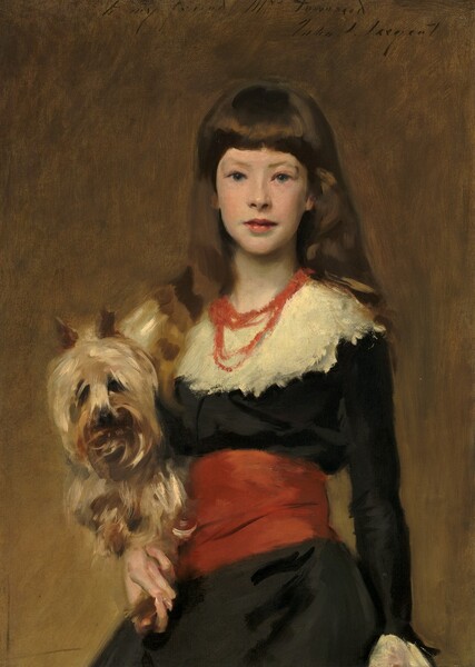 Shown from the hips up, a pale-skinned young girl wearing an ink-black garment with cream-white and coral-red accents holds a terrier dog as she looks directly at us in this vertical portrait. The portrait is loosely painted with visible brushstrokes throughout, especially in the hair, clothing, dog, and background. The girl’s body is slightly angled to our left but she turns her oval face to us. She slightly cocks one faint brow as she gazes out with large, pale blue eyes. She has smooth cheeks, and her full, dusty rose-pink lips are closed. Her chestnut-brown hair curtains her forehead in thick bangs and falls down past her shoulders. Her black dress has long, tightly-fitting sleeves and is cinched with a wide, oversized red sash, presumably tied at the back. A multi-stranded, coral-red necklace lies over her layered, cream-white lace collar, which extends to and just past her shoulders. A long, white cuff falls over her left wrist, down by her side. With her other hand, to our left, she supports the terrier against her right hip. The long fur around the dog’s dark eyes is shimmering, flax brown. Caramel-brown ears poke up from the top of its head. The background behind the pair lightens from fawn brown across the top to golden brown along the bottom edge. The artist inscribed and signed the painting in slanting, cursive letters at the top right corner: “to my friend Mrs Townsend John S. Sargent.”