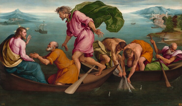 Close to us, six light-skinned men crowd into two small wooden boats that together span the width of this horizontal painting. The bow of the boat to our left overlaps the stern of the boat to our right. In the stern of the boat to our left, along the left edge of the canvas, a man, Jesus sits in profile facing our right. A marine-blue garment drapes around his waist and legs over a rose-pink tunic, and three rays of gold light emanate from the top, front, and back of his head. He raises his left hand toward the other two men in his boat. A bearded, balding man wearing marigold orange kneels with his hands pressed together in prayer in front of Jesus. To our right, at the bow of the boat and near the center of the composition, a younger bearded man with flowing hair steps toward Jesus, his arms outstretched. His pink tunic and emerald-green cape billow around him. Two muscular, bare-chested men bend over the side of the boat to our right, pulling in a fishing net. A balding man with a white beard sits in the bow of that boat, his body facing our left. He looks over his left shoulder toward the water and the half-submerged oar he holds. Blue water stretches into the distance between a distant mountain to our left and the meandering shoreline to our right. The horizon where the blue sky meets the water is close to the top edge of the composition.