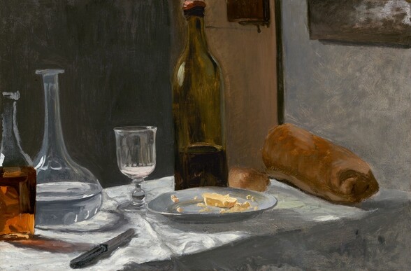 Two bottles, a carafe, drinking glass, plate, knife, and loaf of bread are arranged on a table covered with a white cloth in this horizontal still-life painting. The narrow table angles from the lower left toward the wall to our right. The bright white cloth is slightly rumpled, and the shadows are painted with silvery gray. A clear glass, square-bodied bottle holding amber-brown liquid extends off the left edge of the canvas. Next to it, a long-necked carafe filled halfway with clear liquid has a low, wide belly. The black handle of the knife angles toward us in the lower left corner, the blade pointing back to the other objects on the table. Just beyond the knife is a glass with a low stem and tall bowl, a silver-colored plate holding yellow material, perhaps bread or butter, and a green bottle filled about a third of the way with dark liquid, presumably red wine. The long loaf of bread is at the far side of the table. One round, crusty end of the loaf has been broken off and lies nearby. The room behind the table has nickel-gray walls on either side of a brown rectangle, perhaps a door or panel. A dark brown square along the top of the composition is hard to interpret. The objects and setting are loosely painted so some details are indistinct.