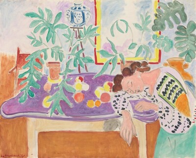 To our right in this vibrantly colored, stylized, nearly square painting, a woman with light, peach-colored skin and chestnut-brown hair sits slumped along a table as she sleeps, her head resting on one extended arm. The lilac-purple tabletop has round forms representing fruit scattered around a potted plant. Many of the forms are outlined with gray and filled in with mostly flat areas of color in mint and sage green, icy blue, coral red, orange, and lemon yellow. The tabletop curves around its edges and the surface is vivid purple, while the skirt and legs of the table are pale ginger brown. The woman’s head rests facing us on her bent right arm, that hand dangling over the front edge of the table. She rests her other hand, closer to us, near the crook of her elbow. She wears a white, blousy top with rows of navy-blue zigzags on the shoulder and elongated dots on the sleeves, and a light, mint-green skirt. Her brown hair seems to be pulled back and gathered into bunches of curving waves. Her stylized eyes, nose, and mouth are drawn simply with gray lines. The round orange, peach, and yellow fruit on the table are scattered near her arm and across the table to the other side, close to a plant in a brown clay pot. The plant has shoots of long, curving stems with vibrant spruce-green leaves. Two more plants are behind the woman near the back wall, in front a rectangular opening over the woman that could be a window or mirror. The glass is painted with streaks of baby blue and pale magenta pink around a field of white, and is outlined with a band of sunshine yellow and then scarlet red. The wall around it is also painted with watercolor-like, soft fields of pale blue and pink. The floor under the table and to our left is a flat field of caramel brown. Behind the table and to our left, forms suggest a wooden chair and a blue and white ceramic pot on a tall, spindly stand. In the lower left corner of the canvas, the artist signed and dated the work with dark red paint: “40 Henri Matisse.”