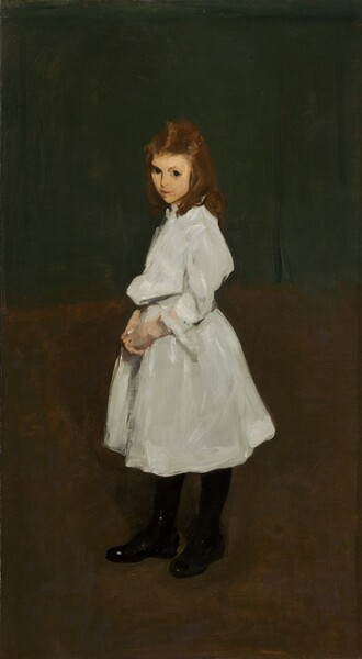 A young, pale-skinned girl wearing a white dress stands against a darkened background in this vertical portrait painting. Her body faces our left in profile, and she clasps her hands in front of her pelvis. Her face turns a bit to us, her chin pulled back so she looks at us with large, black eyes from under her brows. She has a delicate nose, pink lips, and a pointed chin. Her cinnamon-brown hair is pulled halfway up, away from her forehead, and falls down over her shoulders. Her dress has a high collar, a loose bodice, and long sleeves. It is cinched at the waist and falls like a bell to just below her knees. She wears black stockings and shoes. The room in which she stands has a brown floor, and the wall behind her is forest green. The portrait is loosely painted so brushstrokes are visible, especially in the girl’s face and dress.