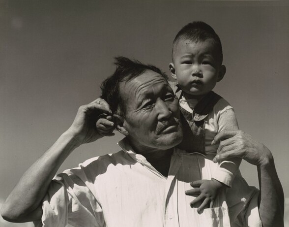 Grandfather and grandson of Japanese ancestry at a War Relocation Authority center, Manzanar, California