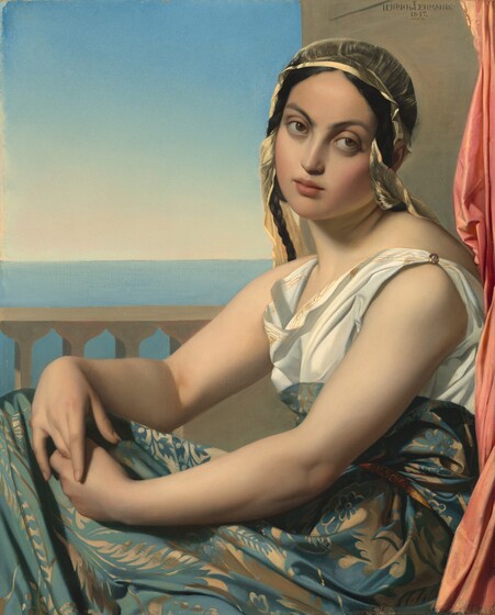 Shown from the lap up, a young woman with smooth, olive-toned skin tinged with pink sits facing our left on a waterfront verandah in this vertical painting. A peanut-brown stone wall behind her angles into the picture from the right edge of the painting, and a stone balustrade runs across the width beyond her. A sliver of a coral-pink drapery hangs just behind her shoulders, to our right. She tips her head down and to our right over slightly slumped shoulders. She looks at or toward us with large brown eyes under dark, arching brows. She has a thin, straight nose and her full, rosy lips are closed. Her black hair is parted down the middle and long braids fall to each side of her face. Her head is covered with a sheer, straw-yellow fabric that winds around the braids. Her bare arms stretch forward from her sleeveless dress, and her hands are loosely clasped on one raised knee. The dress has a white bodice trimmed with a delicate gold pattern around the loose neckline, and a gleaming bead at the shoulder we can see. The voluminous skirt starts just under the bust, and falls in folds around her lower body. It is patterned with stylized, golden-tan leaves, vines, and flowers against a denim-blue background, and the skirt is belted around her waist. Water in the distance is painted with a band of robin’s egg blue. Where the clear sky meets the horizon is misty peach that deepens to baby blue along the top of the composition. The artist has signed and dated the painting in the upper right corner “HEINRICH.LEHMANN 1837 PARIS.”