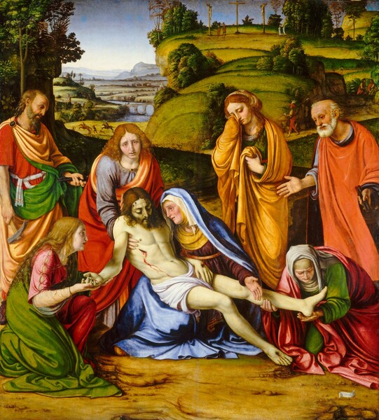 Three men and four women gather in a tight group around the lifeless body of a bearded young man in a landscape in this vertical painting. The people all have pale skin with red around their eyes, and tears fall down most of their cheeks. The dead man, Jesus, is at the center of the composition. His skin is ashen white, and his brown hair falls around his shoulders. Blood trickles from wounds on his forehead, palms, feet, and over his right ribs. He wears only a white loincloth. He rests across the lap of a woman, Mary, who sits on the ground and supports Jesus with her knees. Her brows are gathered high over her eyes as she looks up, her cheeks red. An ochre-yellow cloth wraps across her forehead, down the sides of her face, and across her neck and chest. A white cloth drapes over that, all under a sky-blue cloak that covers most of her burgundy-red dress. One hand disappears behind Jesus’s back, and the other arm is held out, palm up, over Jesus’s legs. The people around Jesus wear dresses, robes, and cloaks in amber yellow, emerald green, carnation pink, rose red, orange, and pale lilac. A clean-shaven man, Saint John the Evangelist, supports Jesus under the armpits as he looks at us. Saint John's lips are parted, and his long, copper-colored hair tumbles over his shoulders. By his side, in the lower left corner of the painting, a woman with long, flowing blond hair, kneels and cradles one of Jesus’s hands. She and Mary lock eyes. Another woman with a white veil over a parchment-brown wimple covering her forehead and neck crouches low to lift one of Jesus’s feet, and she looks down at the wound there. Behind her, a balding, bearded man with a fringe of white curly hair stands with his hands out wide. He holds a pair of pincers in the hand closer to us. To our left, behind Mary, the fourth woman clutches her robe to her chest with one hand and wipes tears with a fist of the fabric with the other. Along the left edge of the composition, behind Saint John the Evangelist, a man looks forlornly down at Jesus as he holds long iron nails in one hand and a hammer down by his side in the other. Grassy mounds rise steeply up to an overlook taking up the top right quadrant of the painting. There, two men hang from crosses to either side of an empty cross. Two pairs of people look at those men. A man carrying a spear and wearing a feathered cap walks on a path along the ridge. In a distant grassy meadow to our left, two men ride horses as another holds up a spear, all facing a person with their hands raised. A river winds through rolling hills back to the horizon, which comes four-fifths the way up the composition. An arched bridge spans the river, and people walk across it or row on a boat in the water near the pilings. The mountains are hazy pale blue in the deep distance, and the sky above fades from azure blue along the top of the painting to milky white along the horizon. A scrolling strip of white paper curls in the lower right corner of the composition.