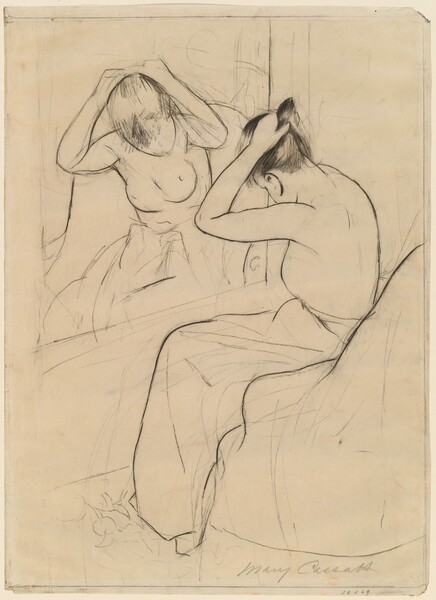 Drawn with black crayon and silvery graphite on cream-colored paper, a woman, nude from the waist up, gathers her hair in her raised hands as she sits before a mirror in this vertical composition. The large mirror is to our left, and the woman’s body is mostly turned away from us, her head bowed. Her lower body is wrapped in a voluminous cloth as she leans forward on a chair. The mirror and room around the woman are loosely drawn with a few, economical lines. The artist signed the work in graphite under the lower right corner, “Mary Cassatt.” Another inscription below reads, “38 x 49.”
